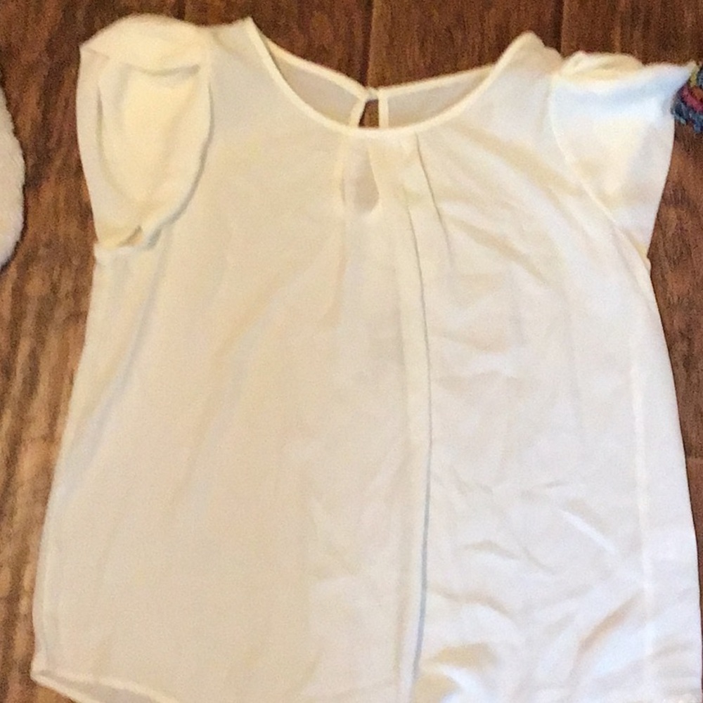 Cream petal sleeved top